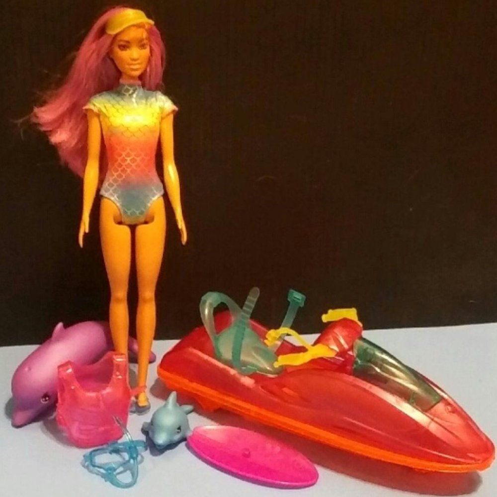 Purple haired Barbie with jet ski and accessories